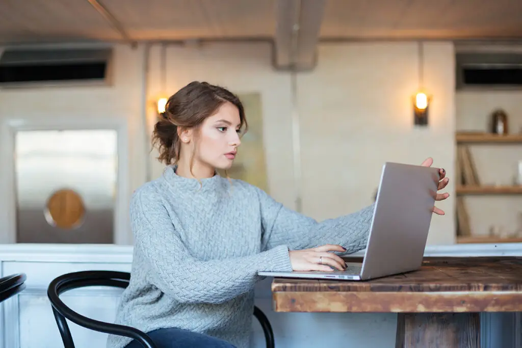 Woman using Laptop Image
