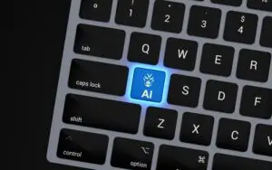 a-close-up-of-a-keyboard-with-a-blue-button