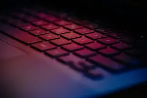 a-close-up-of-a-keyboard-with-a-blurry-background
